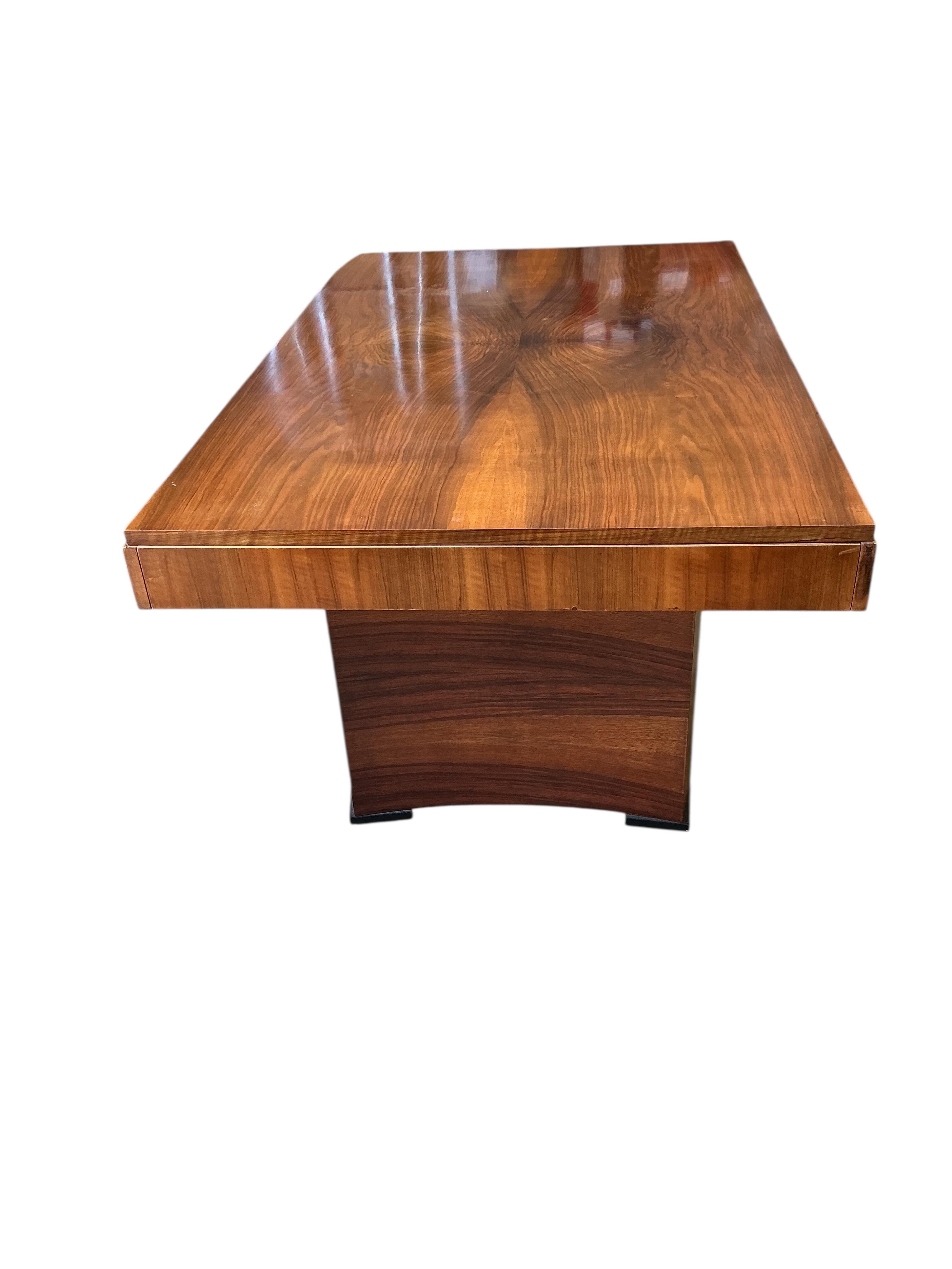 An Art Deco style rectangular walnut dining table, width 254cm extended, two spare leaves, depth 98cm, height 77cm together with six Empire style cherry dining chairs